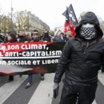 People demonstrate near the Place de la Republique after the cancellation of a planned climate march ahead of the World Climate Change Conference 2015 in Paris