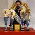 Pasquale Damiano con i trofei conquistati nel corso del Campionato Mondiale Pizza Doc 2023